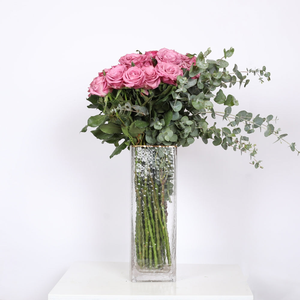 A Enchanting Tale of Pink Roses and Eucalyptus.