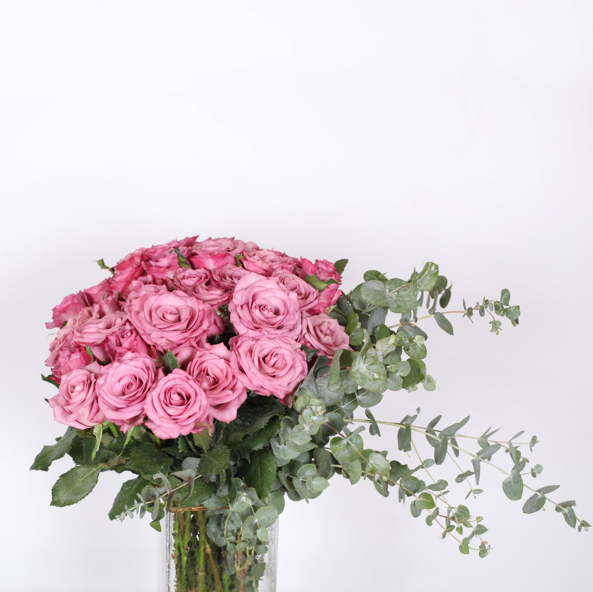 A Enchanting Tale of Pink Roses and Eucalyptus.