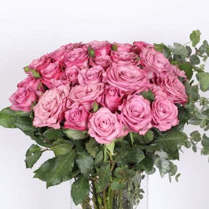 A Enchanting Tale of Pink Roses and Eucalyptus.