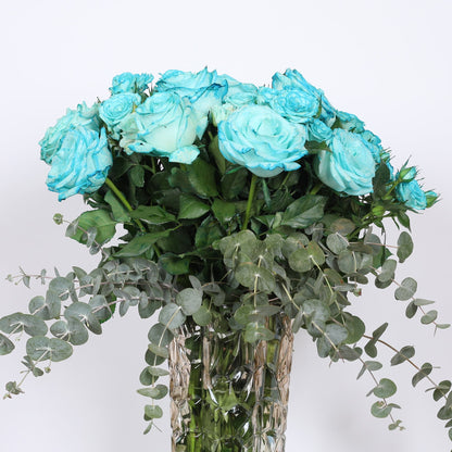 Blossoms in Harmony:  The Dance of the Blue Rose and Eucalyptus.